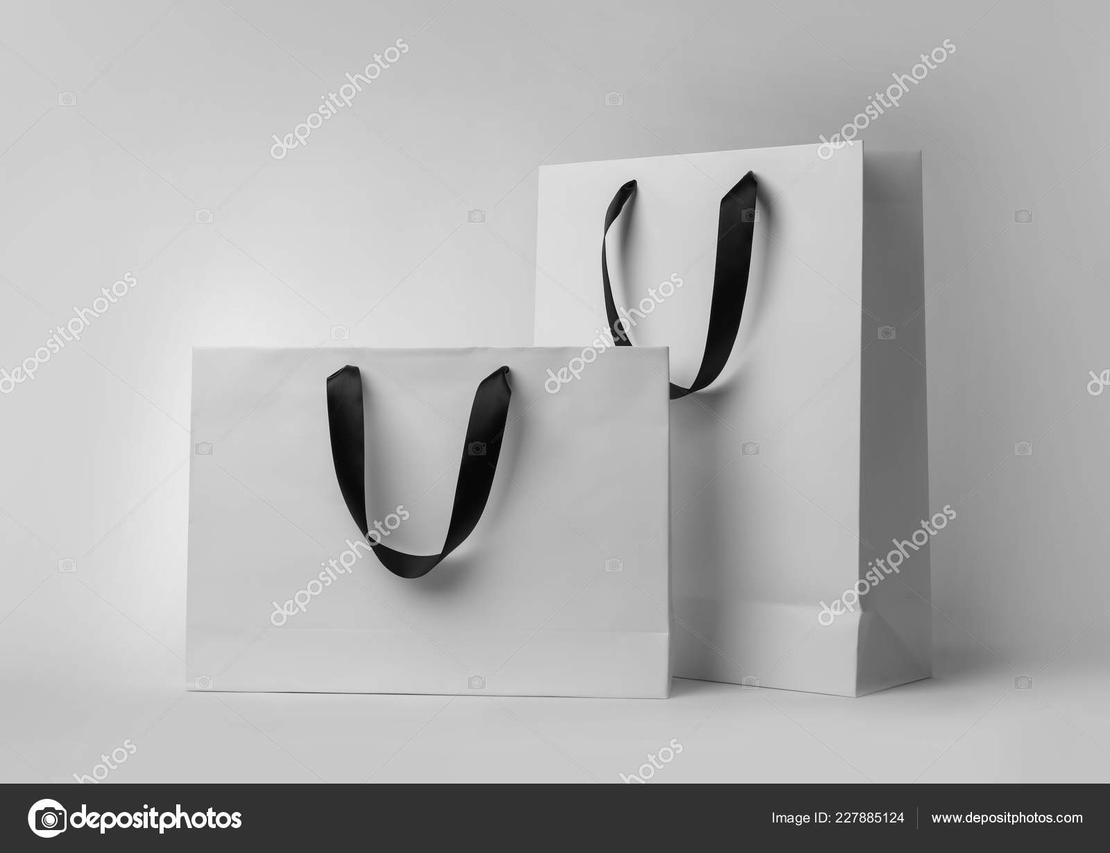 Download Paper Shopping Bags Ribbon Handles White Background Mockup Design Stock Photo Image By C Newafrica 227885124