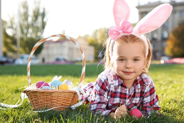 Cute Little Girl Bunny Ears Basket Easter Eggs Park — Stock Photo, Image