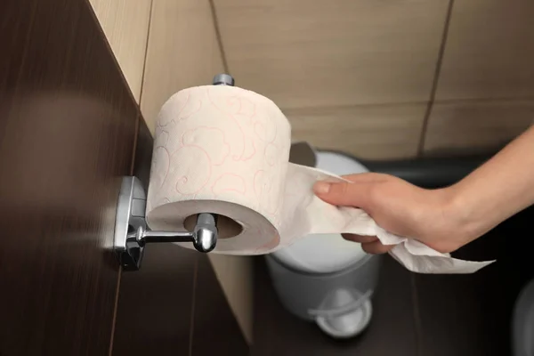 Woman Pulling Toilet Paper Holder Bathroom — Stock Photo, Image