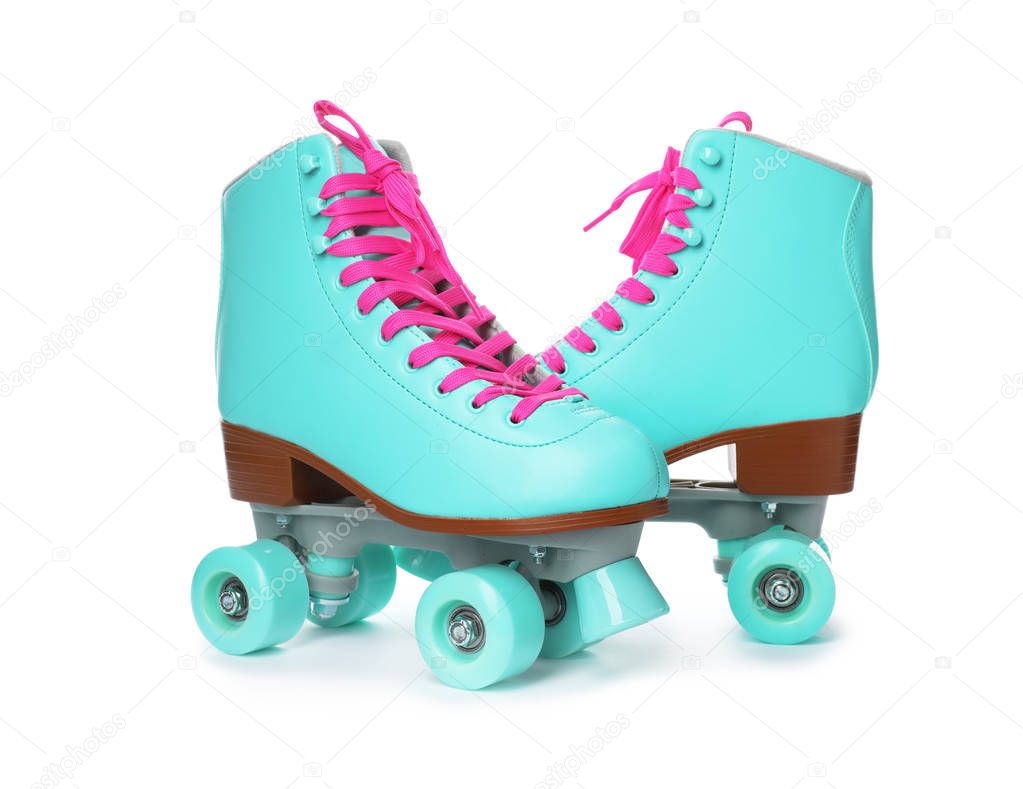 Pair of bright stylish roller skates on white background