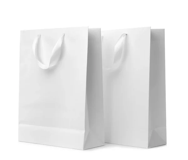 纸购物袋与丝带处理在白色背景 用于设计的模型 — 图库照片