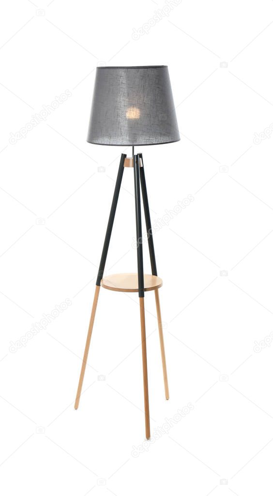 Stylish floor lamp on white background. Idea for interior design