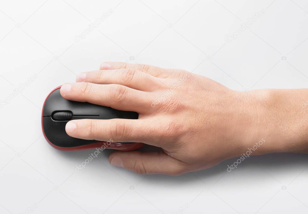 Man using computer mouse on white background, top view