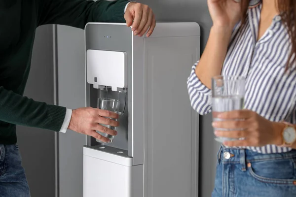 Young Man Taking Glass Water Cooler Office Closeup — Stock Photo, Image