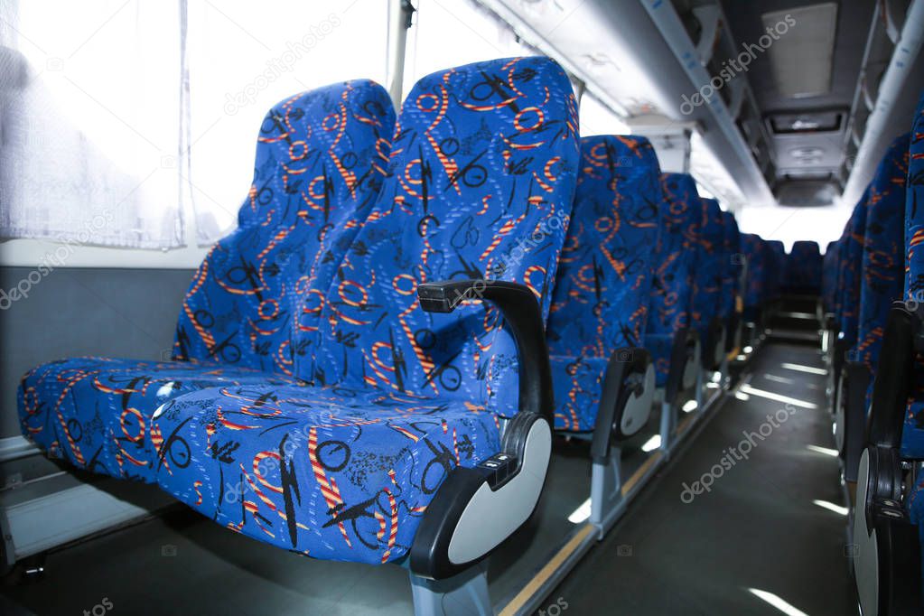 View of bus interior with comfortable seats