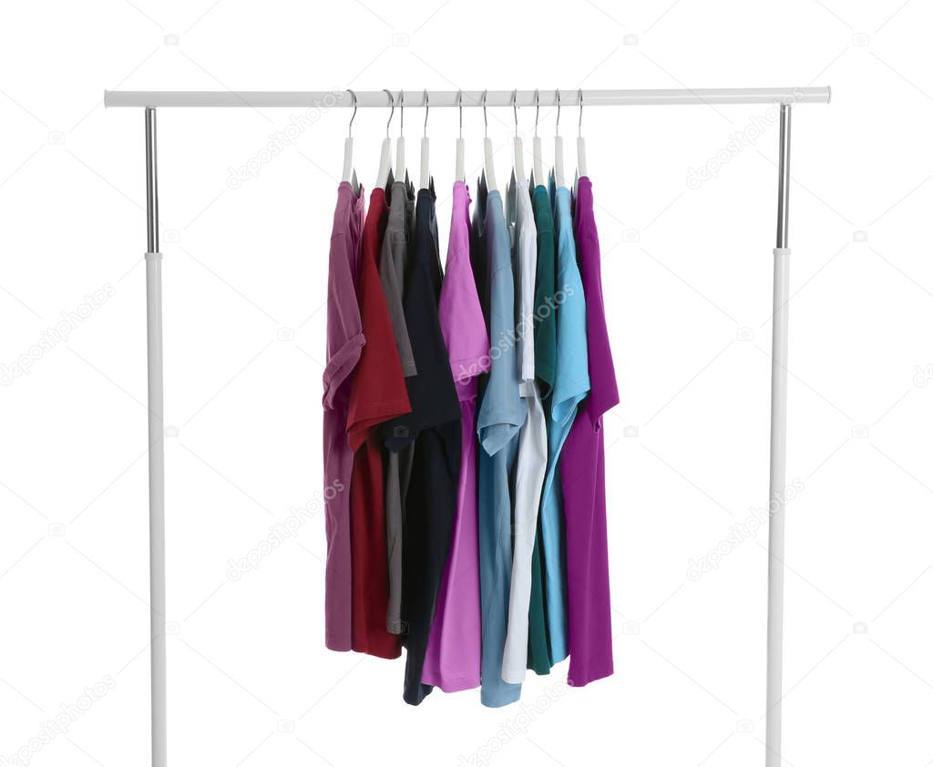 Wardrobe rack with men clothes on white background