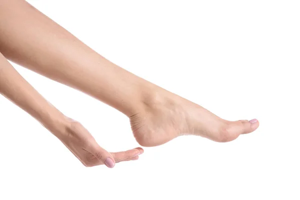 Жінка Торкається Ноги Білому Тлі Крупним Планом Спа Лікування — стокове фото