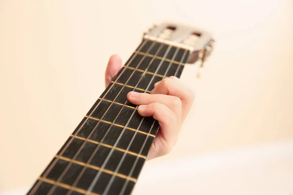 Niña Tocando Guitarra Madera Vista Cerca —  Fotos de Stock
