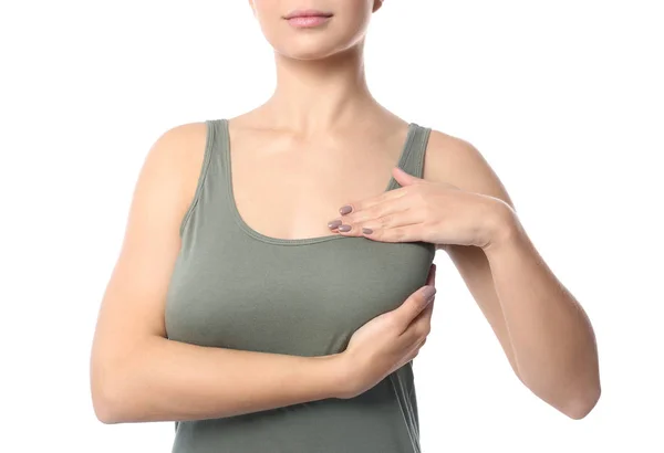 Γυναίκα Ελέγχοντας Στήθος Της Άσπρο Φόντο Κοντινό Πλάνο — Φωτογραφία Αρχείου
