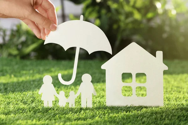 Woman Holding Paper Umbrella Cutout Family House Fresh Grass Closeup — Stock Photo, Image