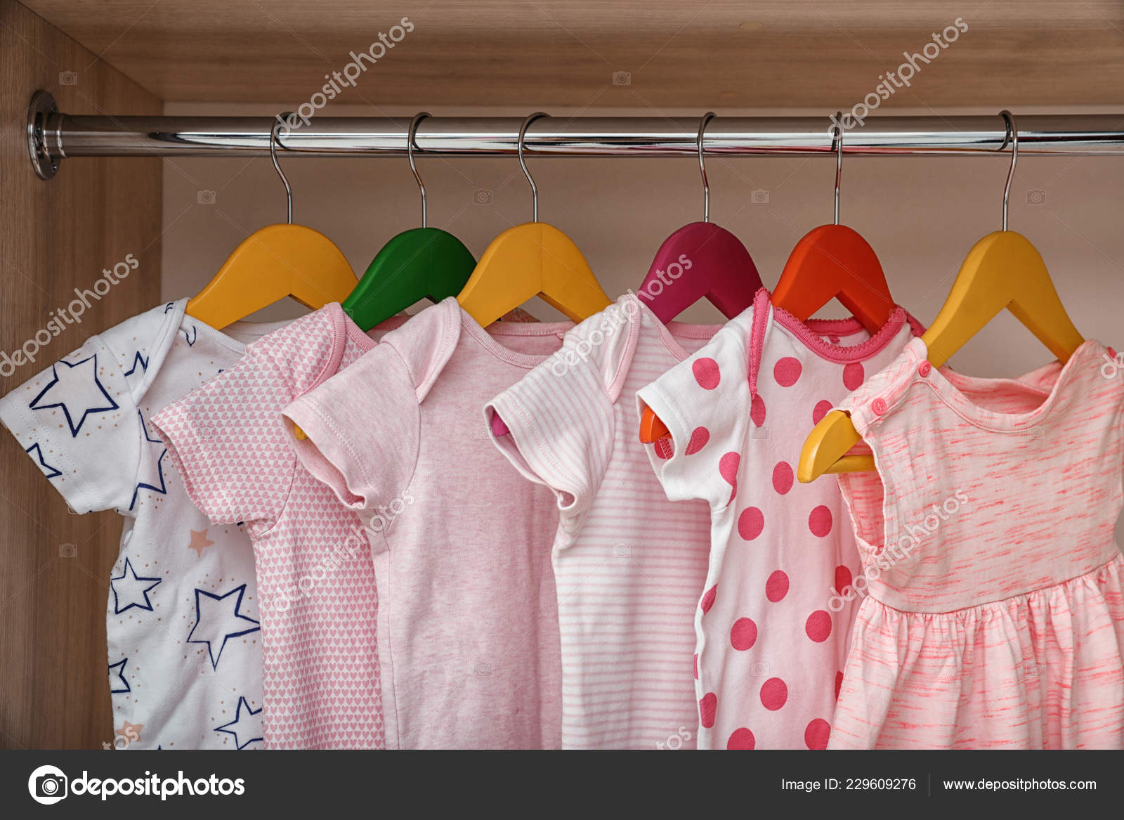 Hangers Baby Clothes Rack Wardrobe Closeup Stock Photo by ©NewAfrica  231223854