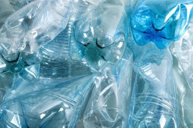 Arka plan, closeup olarak birçok plastik şişeler. Geri dönüşüm kavramı