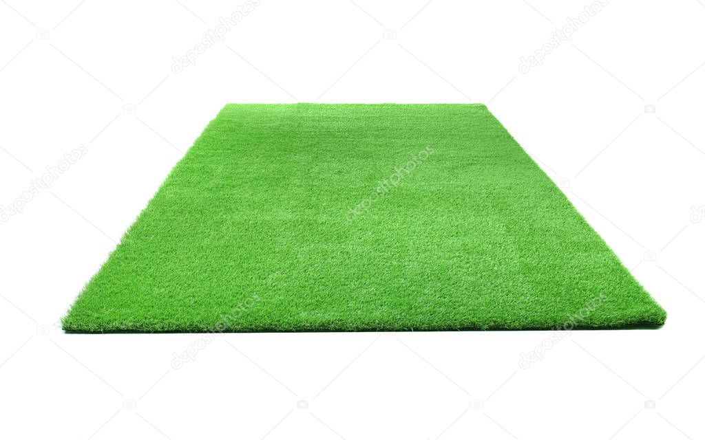 Artificial grass carpet on white background. Exterior element