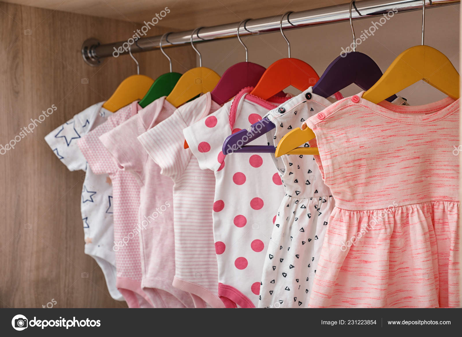 Hangers Baby Clothes Rack Wardrobe Closeup Stock Photo by