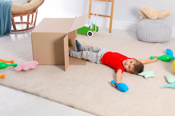 Cute Little Boy Playing Cardboard Box Home — Stock Photo, Image