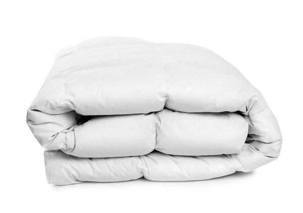 Folded clean blanket on white background. Household textile