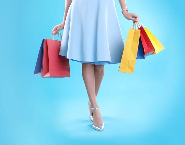 Young Woman Shopping Bags Color Background Closeup Legs — Stock Photo, Image