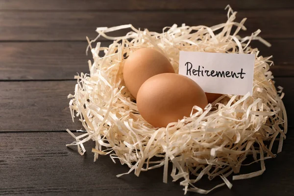 Eggs Card Word Retirement Nest Wooden Background Pension Concept — Stock Photo, Image
