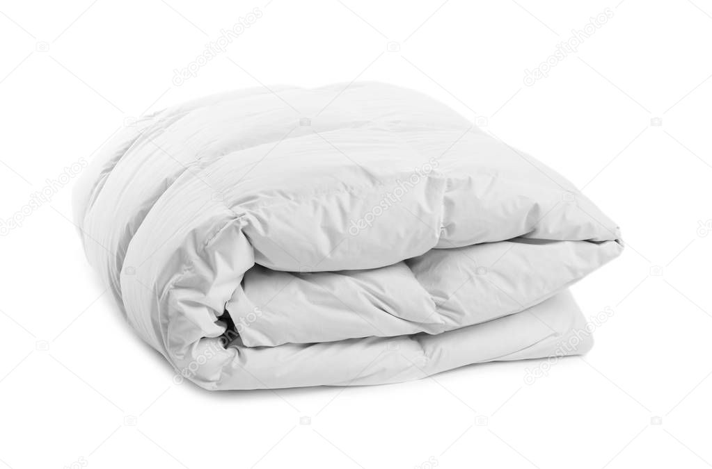 Folded clean blanket on white background. Household textile