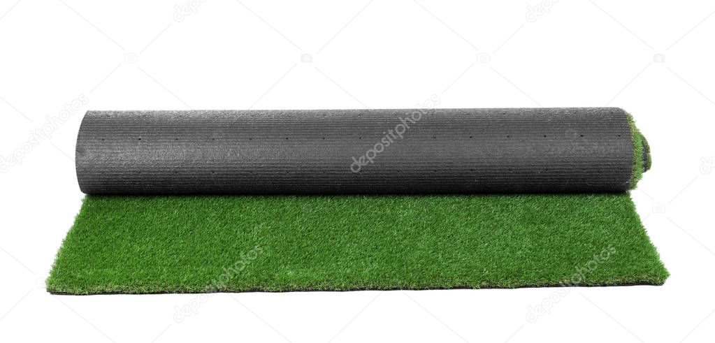 Rolled artificial grass carpet on white background. Exterior element