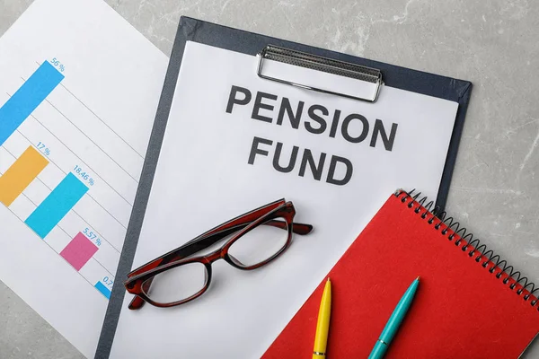 Stationery Glasses Notebook Chart Paper Words Pension Fund Table Flat — Stock Photo, Image