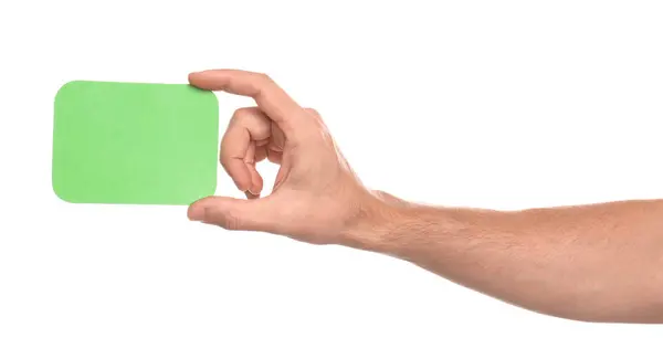 Άνθρωπος Που Κρατά Την Πράσινη Κάρτα Άσπρο Φόντο Closeup Των — Φωτογραφία Αρχείου