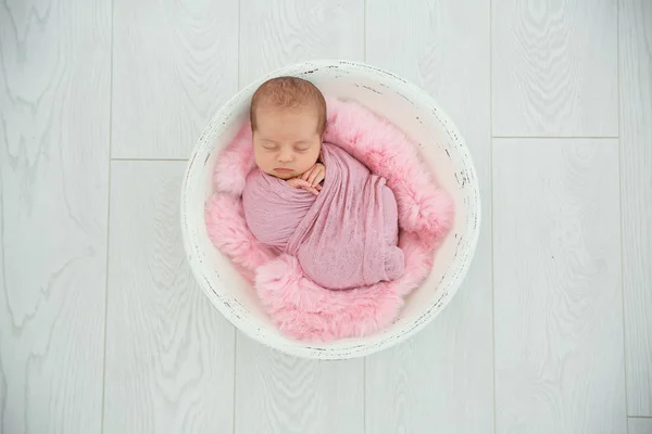 Adorable Newborn Girl Lying Baby Nest Light Background Top View — Stock Photo, Image