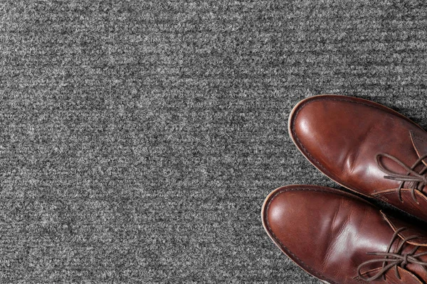 Brown Classic Shoes Gray Doormat Top View Space Text — Stock Photo, Image