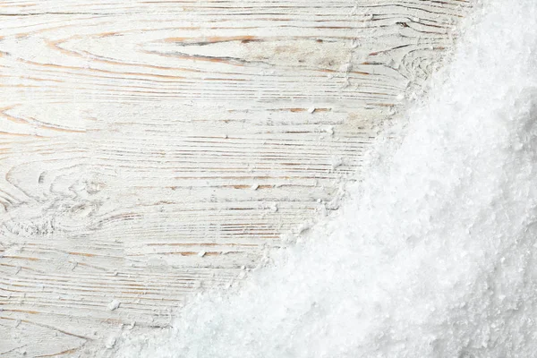 真っ白な雪と木製の背景 トップ ビュー上のテキストのためのスペース — ストック写真