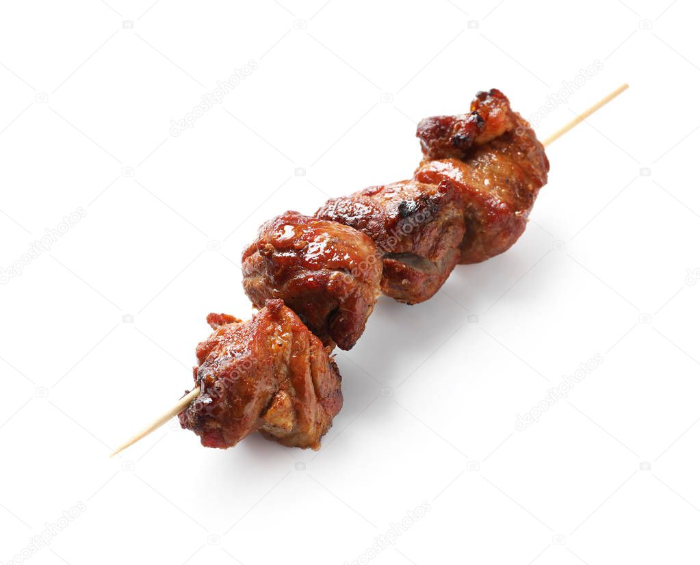 Skewer with delicious barbecued meat on white background