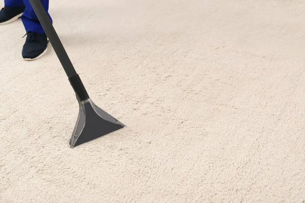 Man Removing Dirt Carpet Vacuum Cleaner Indoors Closeup Space Text — Stock Photo, Image