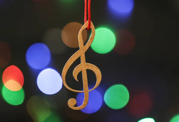 Clave Agudos Madera Contra Luces Borrosas Música Navideña —  Fotos de Stock