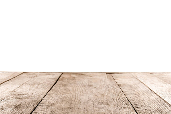 Empty wooden table surface on white background