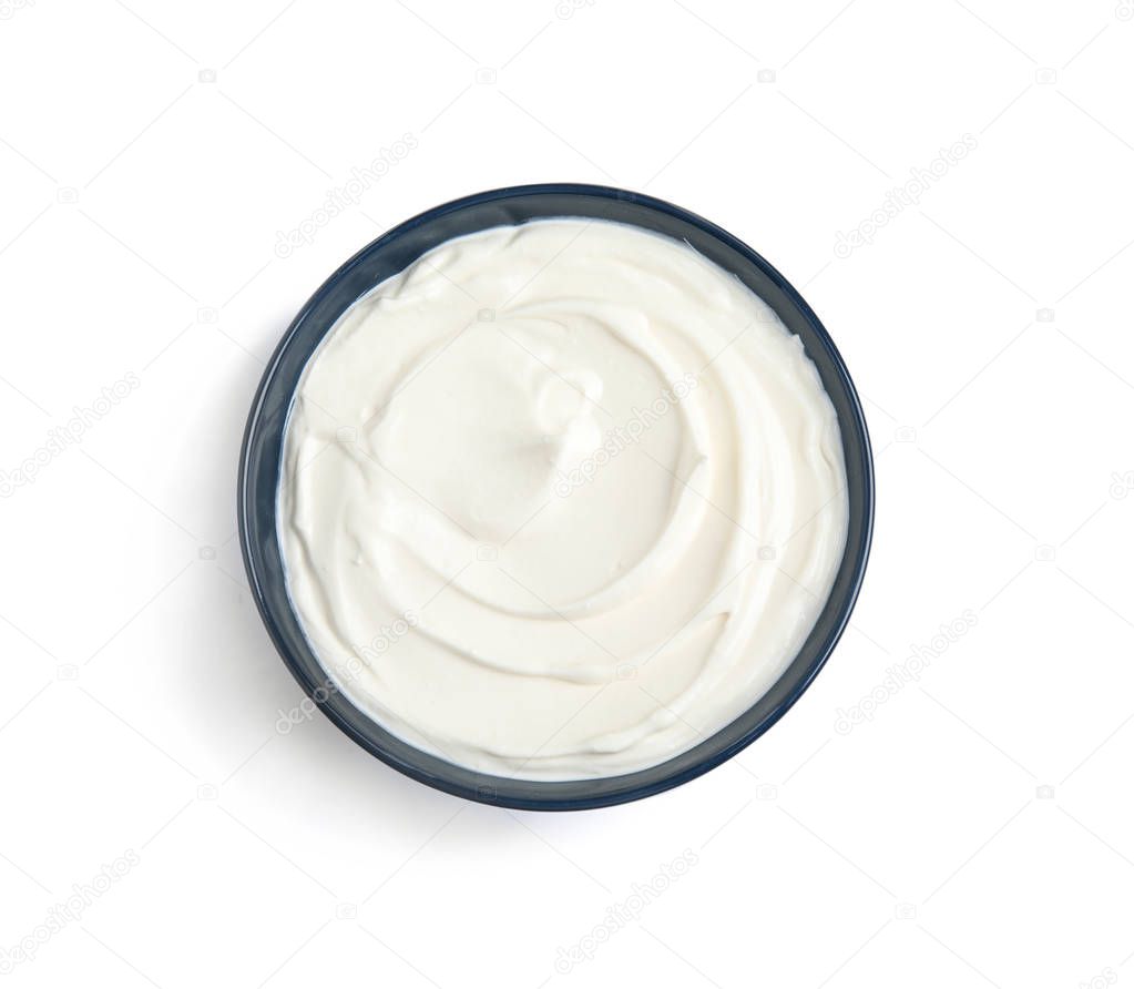 Bowl with fresh sour cream isolated on white, top view
