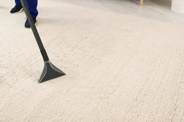 Man Removing Dirt Carpet Vacuum Cleaner Indoors Closeup Space Text — Stock Photo, Image