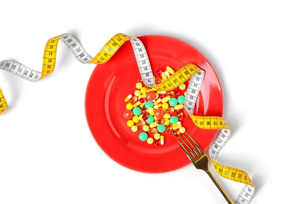 Plaat Met Gewichtsverlies Pillen Vork Meetband Een Witte Achtergrond Bovenaanzicht — Stockfoto