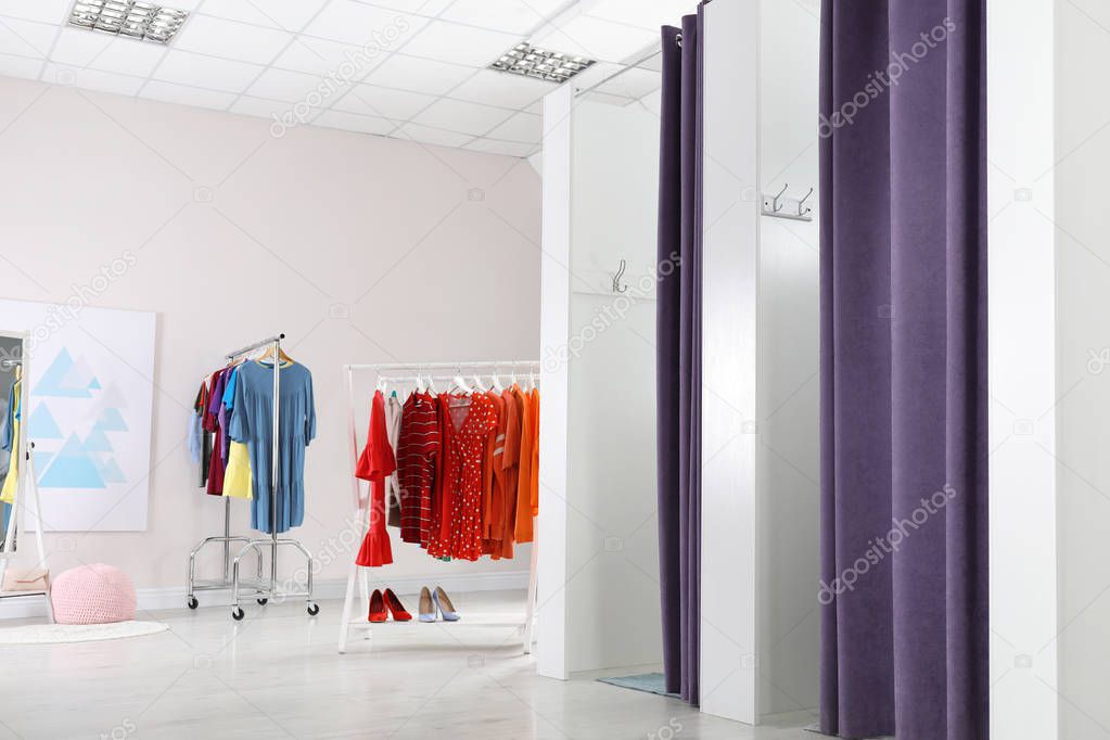 Fashion store interior with dressing rooms. Modern design