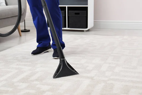 Man Removing Dirt Carpet Vacuum Cleaner Indoors Closeup Space Text — Stock Photo, Image