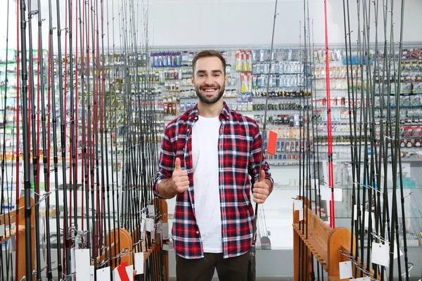 Man Choosing Fishing Rod Sports Shop — Stock Photo, Image