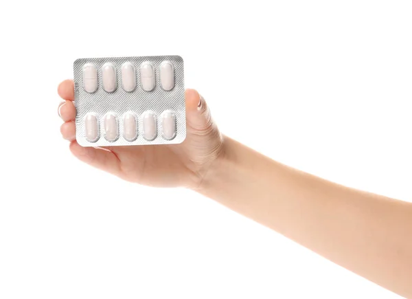 Mulher Segurando Pílulas Blister Fundo Branco Close — Fotografia de Stock