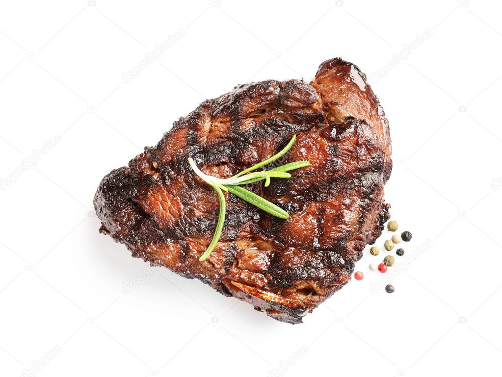 Delicious barbecued steak with rosemary on white background, top view