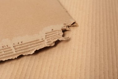 Oluklu karton arka plan, metin için yer olarak. Geri dönüştürülebilir Doğum malzeme