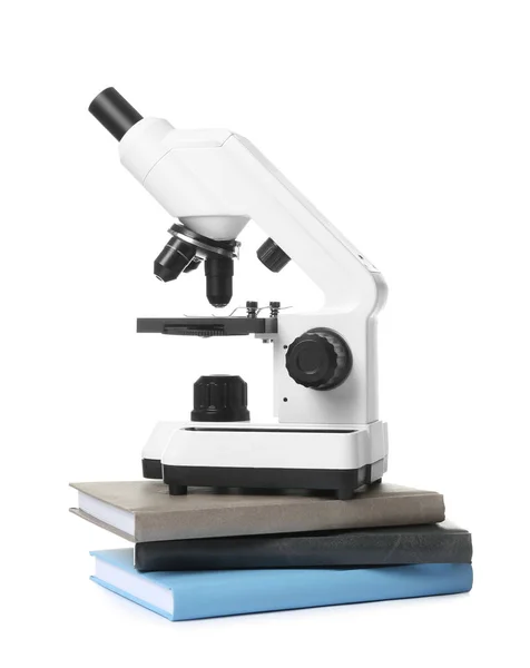 Microscopio Libros Aislados Blanco Estudiantes Medicina —  Fotos de Stock