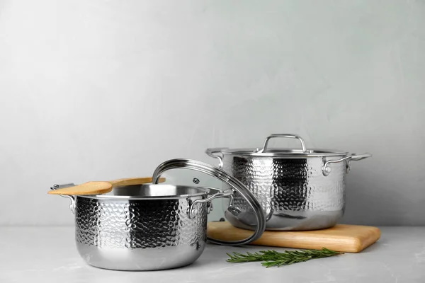 New Clean Saucepans Table Grey Background Space Text — Stock Photo, Image