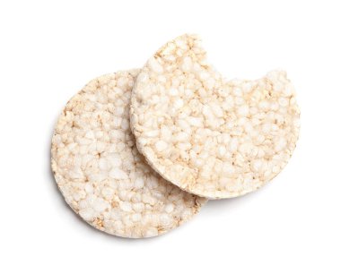 Gevrek pirinç kek beyaz arka planda, üstten görünüm