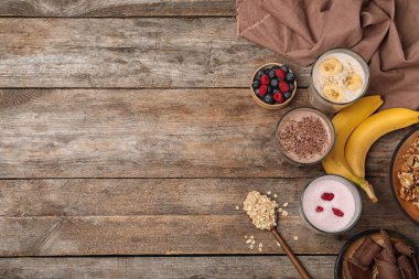 Protein karışımlarından ve malzemeler ahşap masa üzerinde düz yatıyordu kompozisyonu. Metin için yer