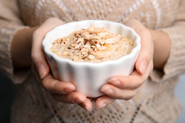 Woman Holding Bowl Quinoa Porridge Banana Nuts Closeup — Stock Photo, Image