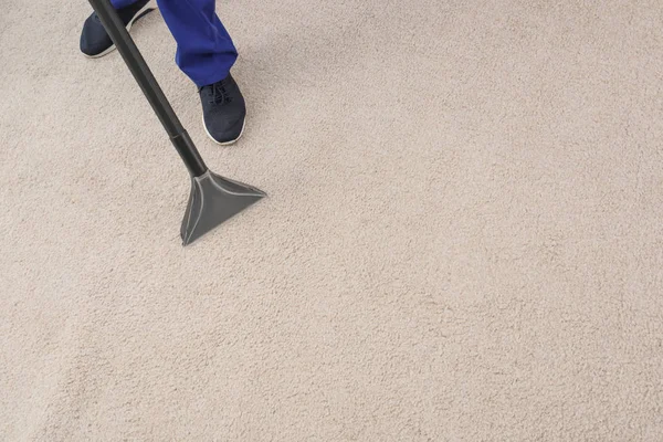 Man Removing Dirt Carpet Vacuum Cleaner Indoors Closeup Space Text — Stock Photo, Image