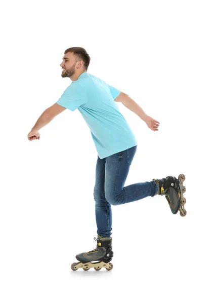 白い背景の上のインライン ローラー スケートと若い男 — ストック写真