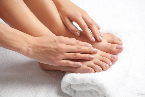 Woman Touching Her Smooth Feet White Towel Closeup Spa Treatment Stock Picture